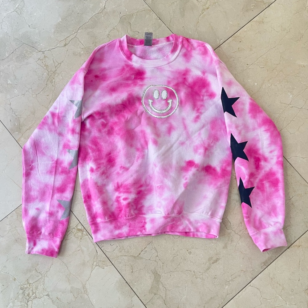 Pink smiley face and star tie dye sweatshirt